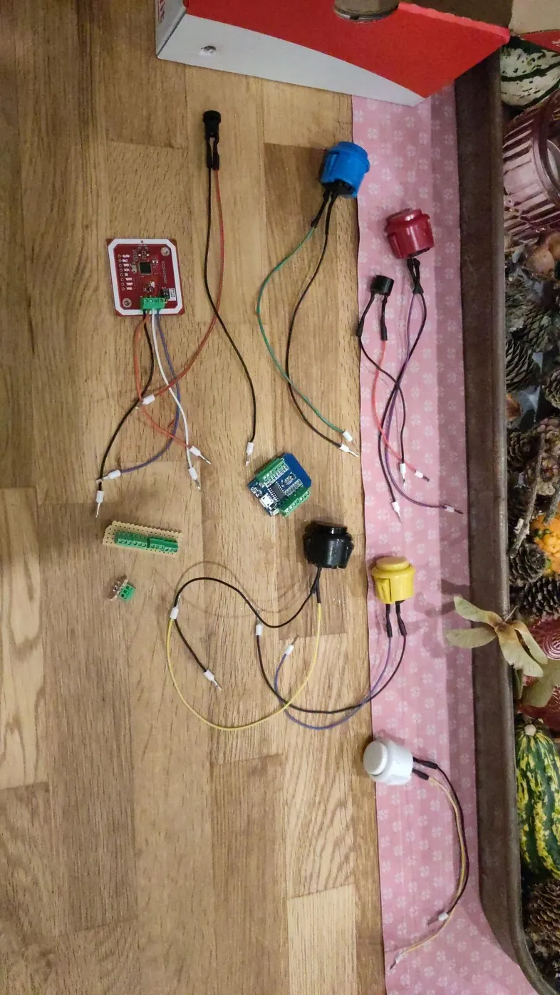 All components of the DIY music box with soldered wires and cable end crimps